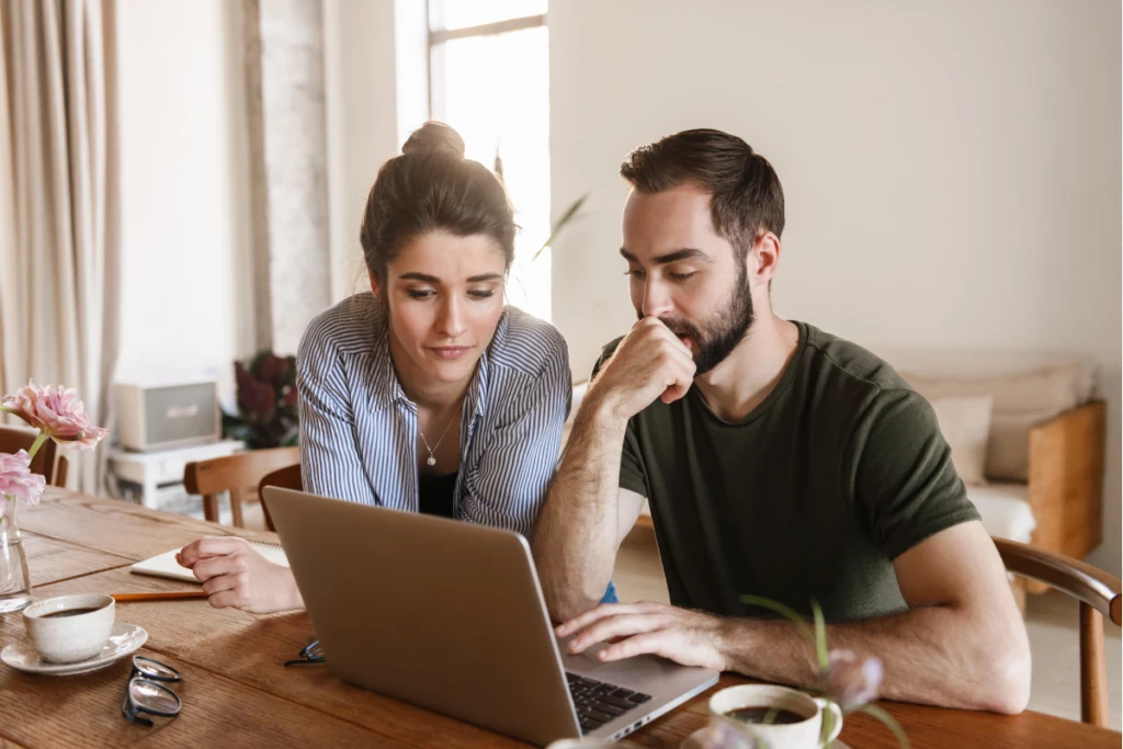the-man-shows-his-girlfriend-how-to-distinguish-tax-credit-vs.-deduction